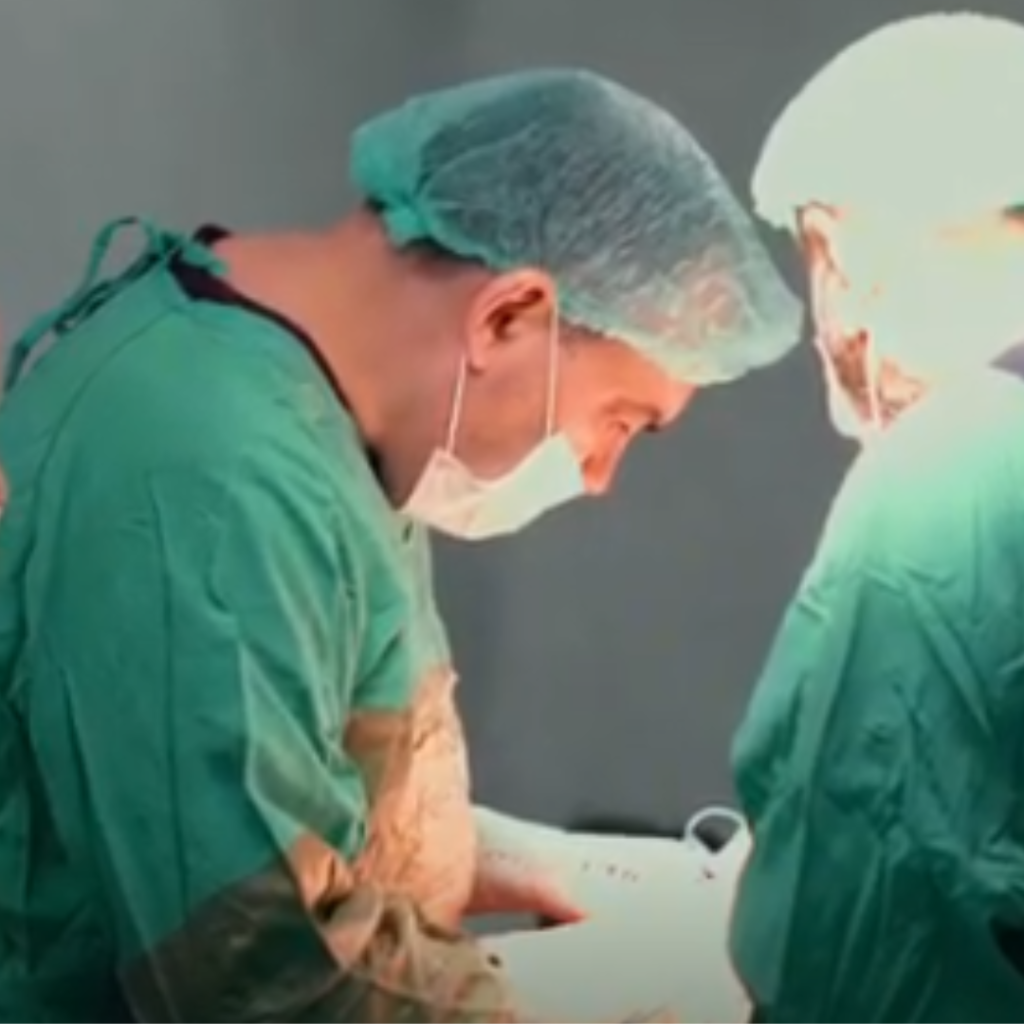 Experienced plastic surgeon performing surgery in an accredited hospital in Turkey during a cosmetic procedure.